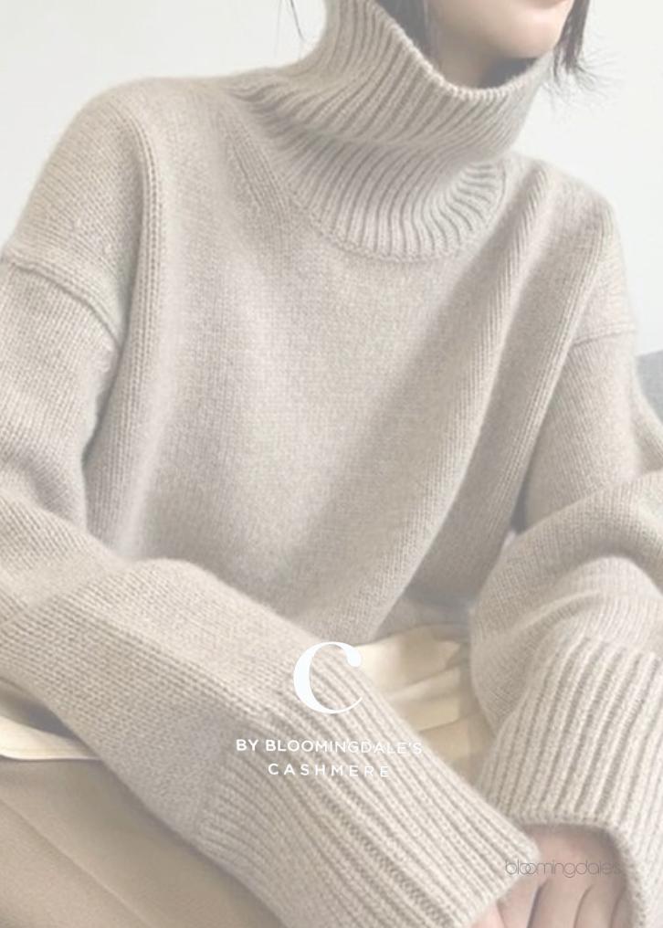 Model in an oversized cashmere turtleneck sweater